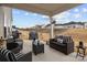 Covered patio with outdoor furniture, a grill, and a view of the landscaped backyard at 7172 Indigo Way, Denver, NC 28037