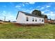 Exterior view of a home, showing its siding, foundation, and surrounding lawn, ready for landscaping at 8455 W Nc 152 Hwy, Mooresville, NC 28115