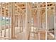 Interior room with studs, insulation, a window and visible utilities in a new build at 8455 W Nc 152 Hwy, Mooresville, NC 28115