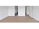 Empty room shows fresh paint and pristine, minimal design at 8455 W Nc 152 Hwy, Mooresville, NC 28115