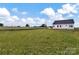 New construction home with green yard and blue skies in a tranquil area at 8455 W Nc 152 Hwy, Mooresville, NC 28115