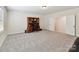 Spacious bonus room with ample carpeted floor space, desk, computer and comfortable chair at 873 Penny Royal Ave, Fort Mill, SC 29715