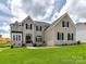 Beautiful brick home with black shutters, manicured lawn and mature landscaping at 873 Penny Royal Ave, Fort Mill, SC 29715