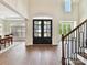 Bright foyer with hardwood floors, high ceilings, and a view into the dining room at 873 Penny Royal Ave, Fort Mill, SC 29715