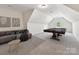 Spacious game room featuring a pool table, neutral decor, and comfortable seating at 873 Penny Royal Ave, Fort Mill, SC 29715