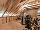 Unfinished attic space showing roof supports, wood framing, and storage space at 873 Penny Royal Ave, Fort Mill, SC 29715