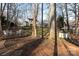 Beautiful backyard featuring a deck, outdoor seating area, and storage shed at 9709 Cloverwood Ct, Charlotte, NC 28270