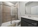 This bathroom features a glass-enclosed shower and a modern vanity with a sink at 9940 Manor Vista Trl, Kannapolis, NC 28027