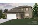 Charming two-story home with a white garage door, warm neutral siding, and manicured front lawn at 9940 Manor Vista Trl, Kannapolis, NC 28027