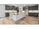 Spacious kitchen with a large island, ample counter space, modern appliances, and recessed lighting at 9940 Manor Vista Trl, Kannapolis, NC 28027