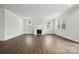 Bright living room showcases fireplace, sleek floors, and generous natural light at 9940 Manor Vista Trl, Kannapolis, NC 28027