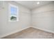 Walk-in closet with shelving and a window at 9940 Manor Vista Trl, Kannapolis, NC 28027
