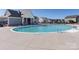 Large community pool surrounded by a spacious patio and lounge chairs at 1022 Doughton Ln, Indian Trail, NC 28079
