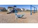 Community playground with a slide, seesaw, and swing set for children to enjoy at 1022 Doughton Ln, Indian Trail, NC 28079