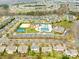 Aerial view of community amenities with pool, tennis courts and playground at 10223 Kelso Ct, Charlotte, NC 28278