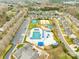Aerial view of community amenities with pool, tennis courts and playground at 10223 Kelso Ct, Charlotte, NC 28278