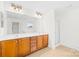 Bathroom featuring dual sinks, cabinets, mirrors, shower and jacuzzi at 10223 Kelso Ct, Charlotte, NC 28278