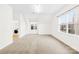 Bright, carpeted bedroom with natural light, adjacent laundry area, and neutral color palette at 10223 Kelso Ct, Charlotte, NC 28278