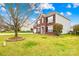 Beautiful two-story brick home with well-maintained lawn and landscaping at 10223 Kelso Ct, Charlotte, NC 28278