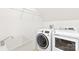 Laundry room with modern appliances and sink at 10223 Kelso Ct, Charlotte, NC 28278