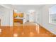Open-concept living and kitchen area with hardwood floors and natural light at 10223 Kelso Ct, Charlotte, NC 28278