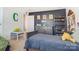 Nicely decorated bedroom with a comfy bed, desk, and decorative wall art at 10321 Solar Way, Charlotte, NC 28278
