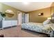 Bedroom featuring a queen bed, white dresser, and neutral decor at 10321 Solar Way, Charlotte, NC 28278