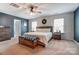 Bright main bedroom with lots of natural light, calm colors, and great interior design at 10321 Solar Way, Charlotte, NC 28278