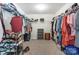 Spacious walk-in closet with ample shelving and hanging storage for organization at 10321 Solar Way, Charlotte, NC 28278