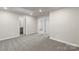 Comfortable bedroom with neutral carpeting and easy access to other rooms at 104 Ciara Pl # B, Mooresville, NC 28117