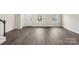 Inviting living room with abundant natural light and a staircase, perfect for gatherings at 104 Ciara Pl # B, Mooresville, NC 28117