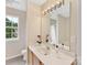 Bathroom featuring vanity with granite countertops, large mirror and shower-tub combination at 1102 Balcorn Pl, Charlotte, NC 28214
