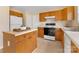 Efficient kitchen design with essential appliances, ample counter space, and functional layout at 1102 Balcorn Pl, Charlotte, NC 28214