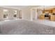 Open-concept space blending living and kitchen areas offers great natural light and an inviting atmosphere at 1102 Balcorn Pl, Charlotte, NC 28214