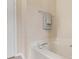 Corner of a tub featuring a towel rack and a doorway at 1102 Balcorn Pl, Charlotte, NC 28214