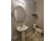 Cozy powder room featuring a pedestal sink at 11148 Kanturk Ct, Charlotte, NC 28213