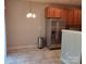 Charming dining area with stainless steel refrigerator at 11148 Kanturk Ct, Charlotte, NC 28213