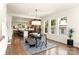 Open dining room with hardwood floors and large windows at 1119 N Myers St, Charlotte, NC 28206
