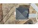 Aerial top-down view of house with dark roof, surrounded by an incomplete lawn at 117 Obadiah Ct, Troutman, NC 28115