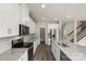 Kitchen with island, granite countertops, and stainless steel appliances at 117 Obadiah Ct, Troutman, NC 28115