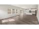 View of the open floor plan with the living room, dining area, and kitchen at 117 Obadiah Ct, Troutman, NC 28115