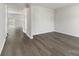 Bright living room features wood floors, natural light and neutral paint at 117 Obadiah Ct, Troutman, NC 28115