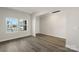 Bright living room with wood floors and ample sunlight at 117 Obadiah Ct, Troutman, NC 28115