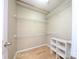 Walk-in closet with white shelving, offering ample storage and organization solutions at 11911 Maria Ester Ct, Charlotte, NC 28277
