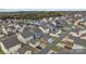 A scenic neighborhood showcasing a variety of home styles, manicured lawns, and a peaceful environment at 12545 Druids Glen Dr, Pineville, NC 28134