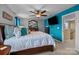 Bedroom with an accent wall, bright natural light, and stylish décor at 12545 Druids Glen Dr, Pineville, NC 28134