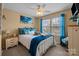 A charming bedroom with a turtle theme, a ceiling fan, and bright natural light at 12545 Druids Glen Dr, Pineville, NC 28134