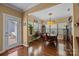Bright dining room with hardwood floors and backyard access at 12545 Druids Glen Dr, Pineville, NC 28134