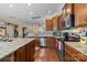 Open kitchen featuring stainless appliances, and granite countertops at 12545 Druids Glen Dr, Pineville, NC 28134
