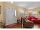 Inviting living room with neutral walls, hardwood floors, and comfortable seating at 12545 Druids Glen Dr, Pineville, NC 28134